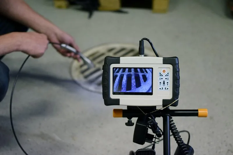 Sewer line inspection camera and display